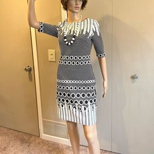dress with black and white geometrical shapes.Casual-Smart casual.Above the knee